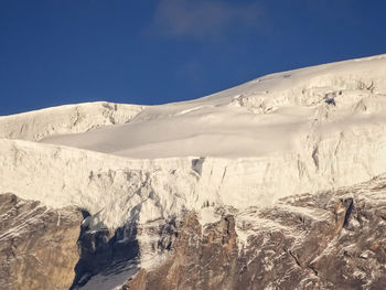 Scenic view of landscape against clear blue sky