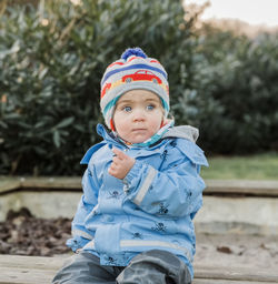 Cute girl looking away during winter