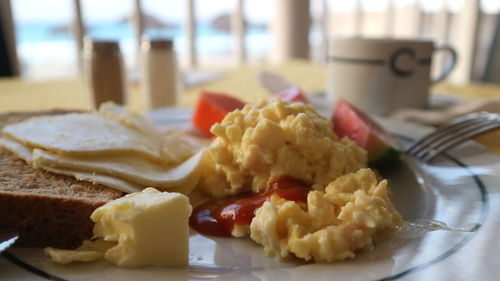 Close-up of breakfast served on table