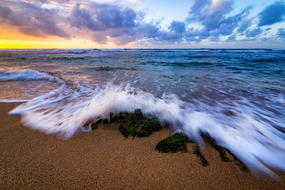 Scenic view of sea against sky during sunset