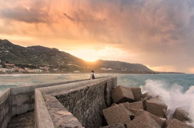 Scenic view of sea against sky during sunset