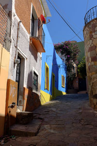 Narrow alley along buildings