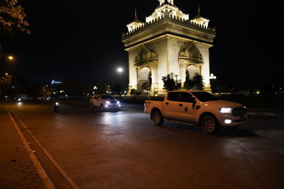 Vehicles on road at night