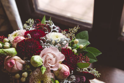 Close-up of bouquet by window