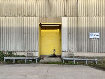 Yellow closed door of building