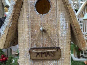 Close-up of clothes hanging on wood