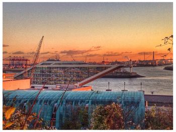 Built structure against sky at sunset