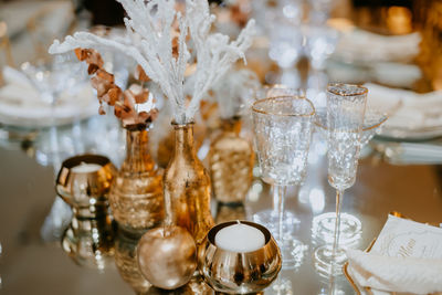 Close-up of gold glass on table