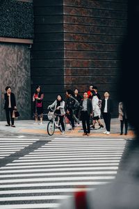 People walking on zebra crossing