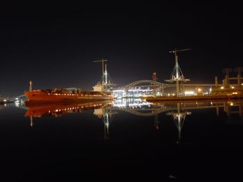 Reflection of illuminated buildings in water at night