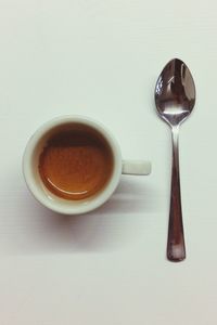 Close-up of coffee cup on white background