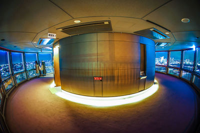 Interior of illuminated subway station