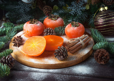 Close-up of orange fruits on table