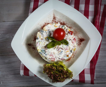 High angle view of fruits in plate on table