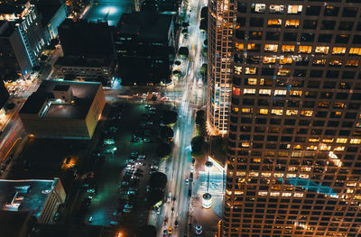 High angle view of illuminated buildings in city