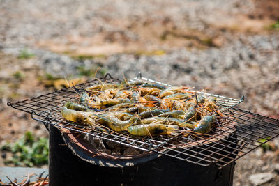 Close-up of meat on barbecue grill