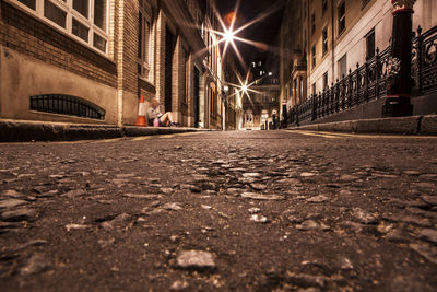 Surface level of illuminated street at night