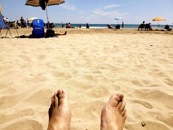 Low section of people on beach