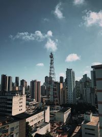 Modern buildings in city against sky