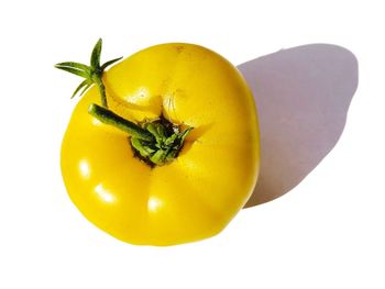 Close-up of lemon against white background