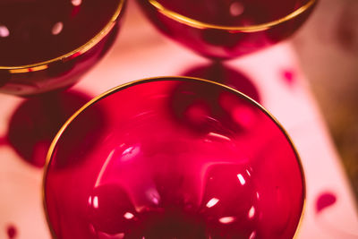 Cropped image of fresh red wineglasses