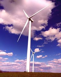 Wind turbines on field