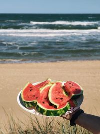 Close-up of strawberry on beach