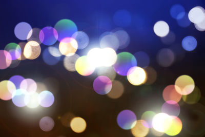 Defocused image of illuminated christmas lights