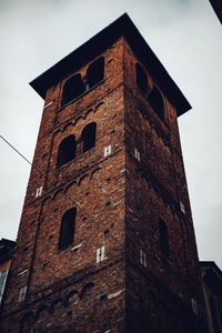 Low angle view of old building against sky