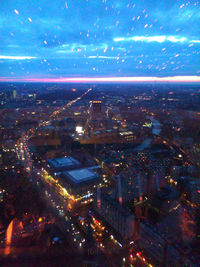 Aerial view of illuminated cityscape