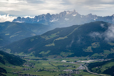 Scenic view of landscape and mountains against sky