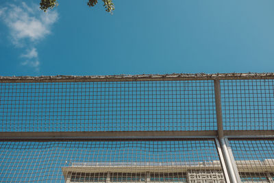 Low angle view of built structure against blue sky