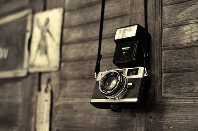 Close-up of camera on table