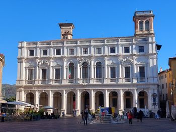 Group of people in front of building