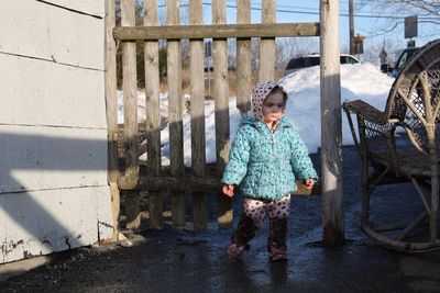 Full length of a woman looking away