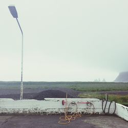 Empty road against sky