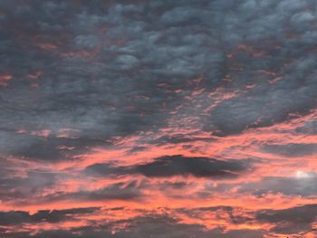 Low angle view of dramatic sky during sunset