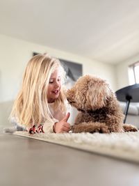 Portrait of woman with teddy bear