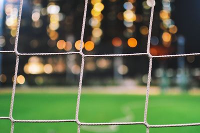 Close-up of net at soccer field