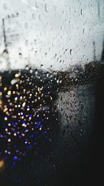 Full frame shot of wet glass window