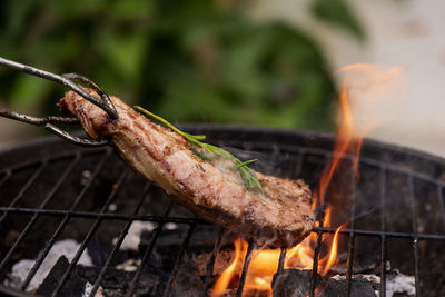 Close-up of meat on barbecue grill