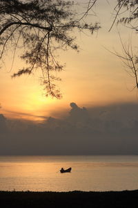 Boat silhouette, early morning, different perspectives, near and far