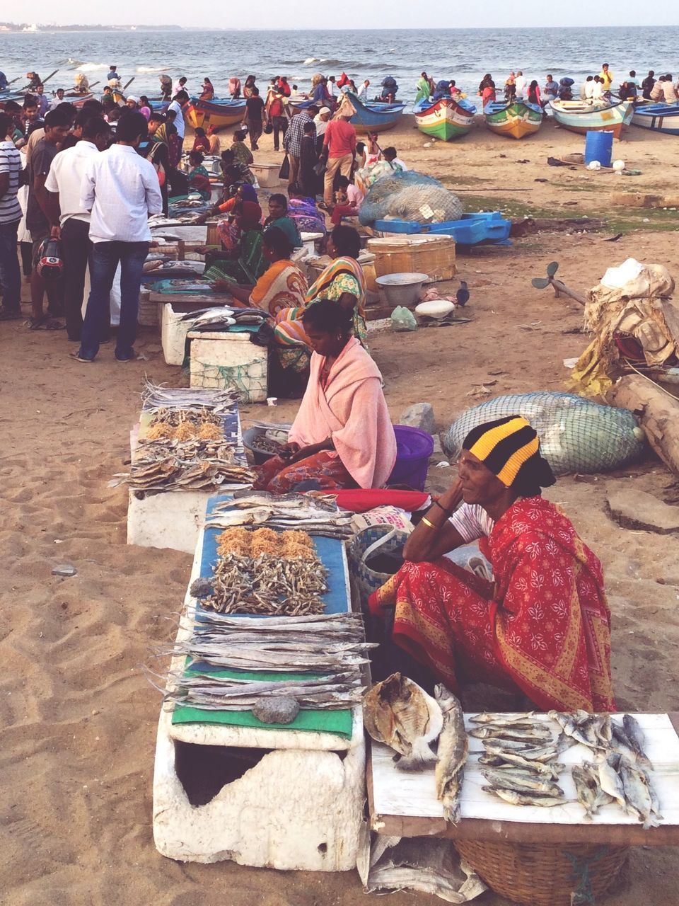 GROUP OF PEOPLE FOR SALE AT MARKET