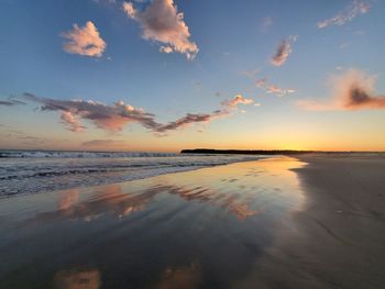 Serene sky over reflective ocean