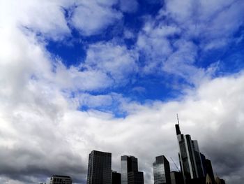 Low angle view of modern buildings against sky