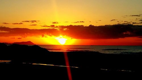 Scenic view of sea at sunset