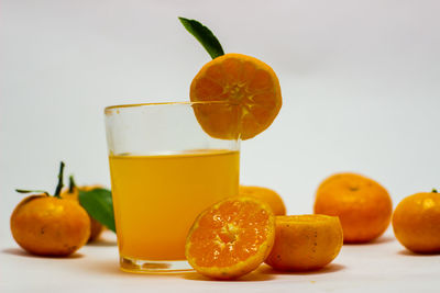 Fruits in glass on table