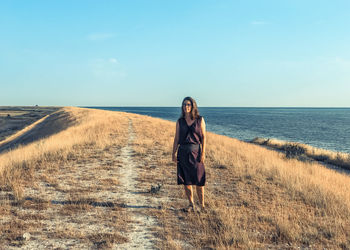 Woman standing at beach