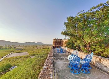 Nature theories- scenic wide view of vast agricultural landscape against clear blue sky