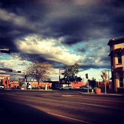 View of road against cloudy sky